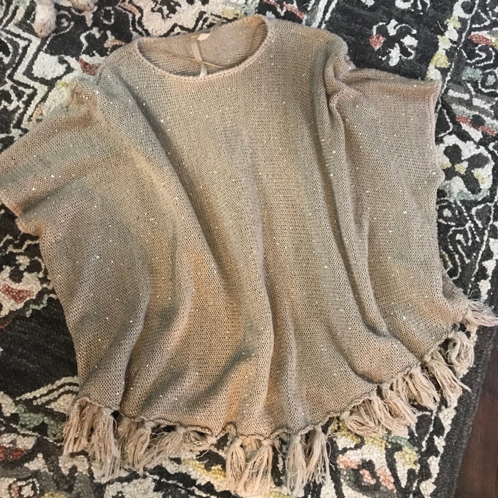 Poncho style sweater.